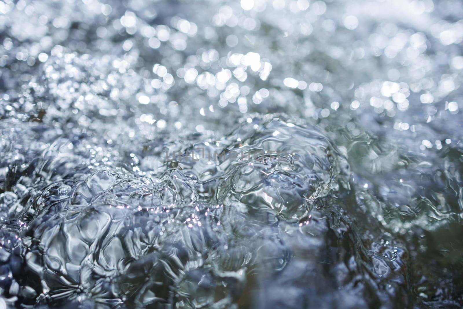 Flowing fresh water with bubbles in River