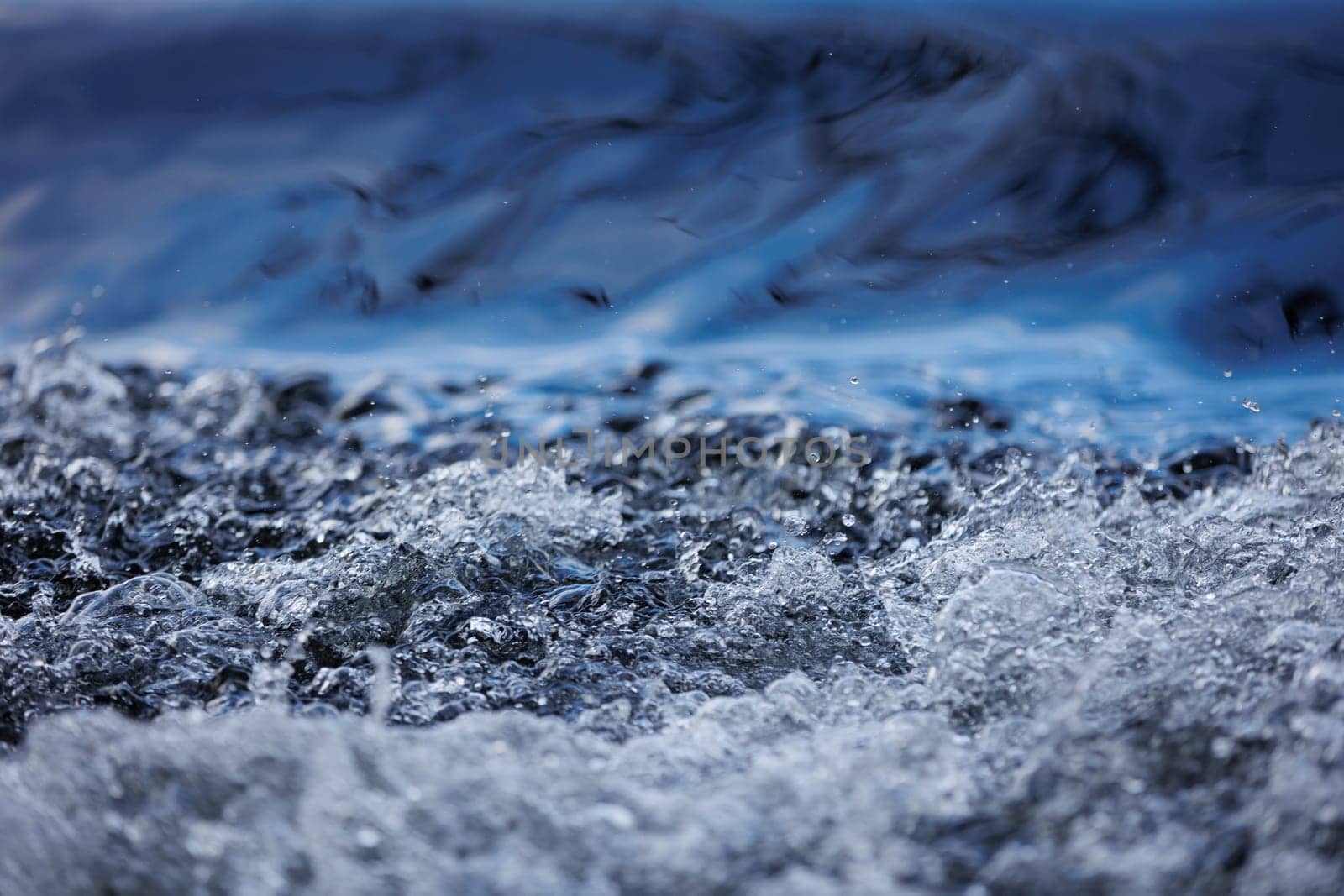 Abstract blue water texture with bubbles