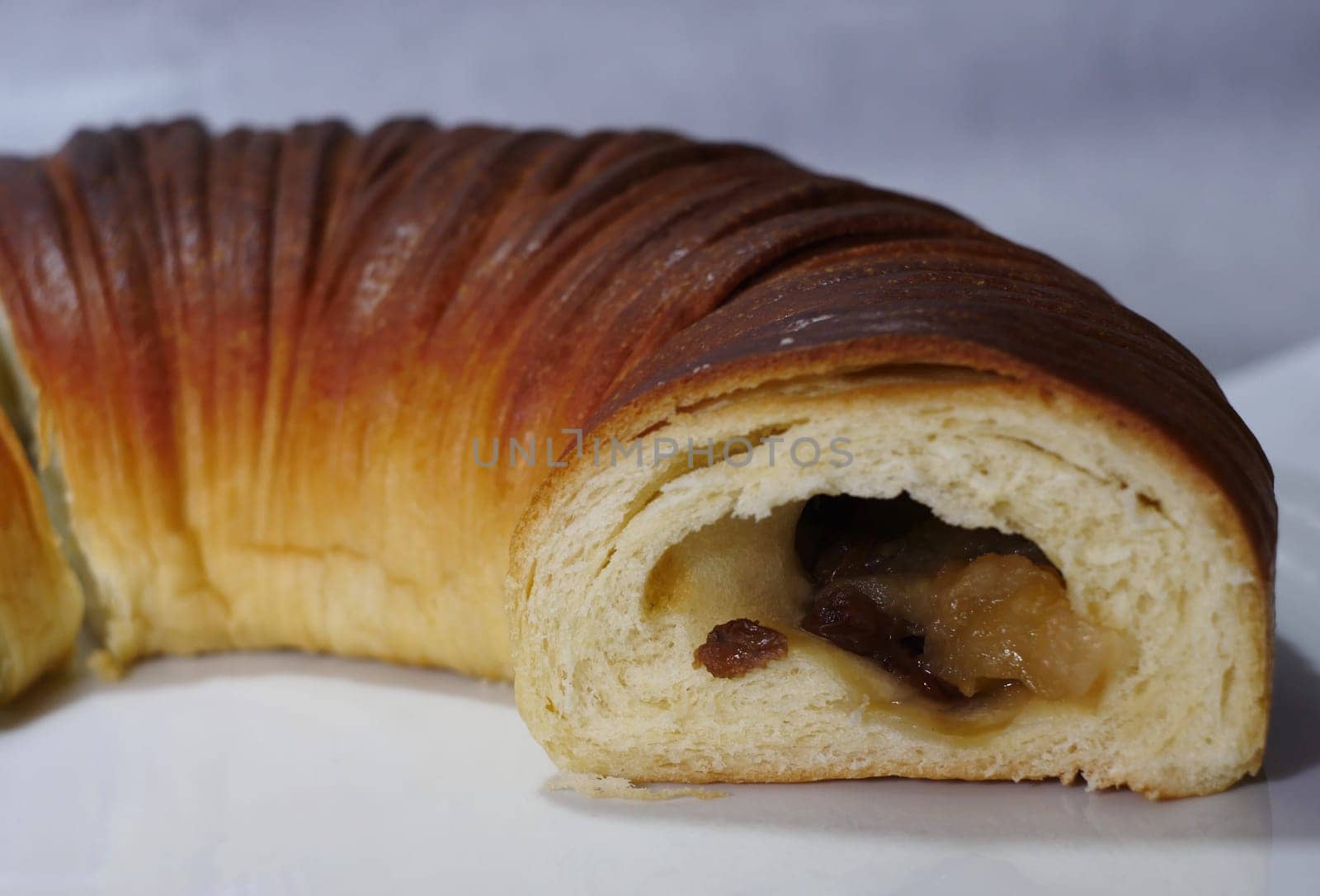 pie roll with sweet filling in the cut close-up