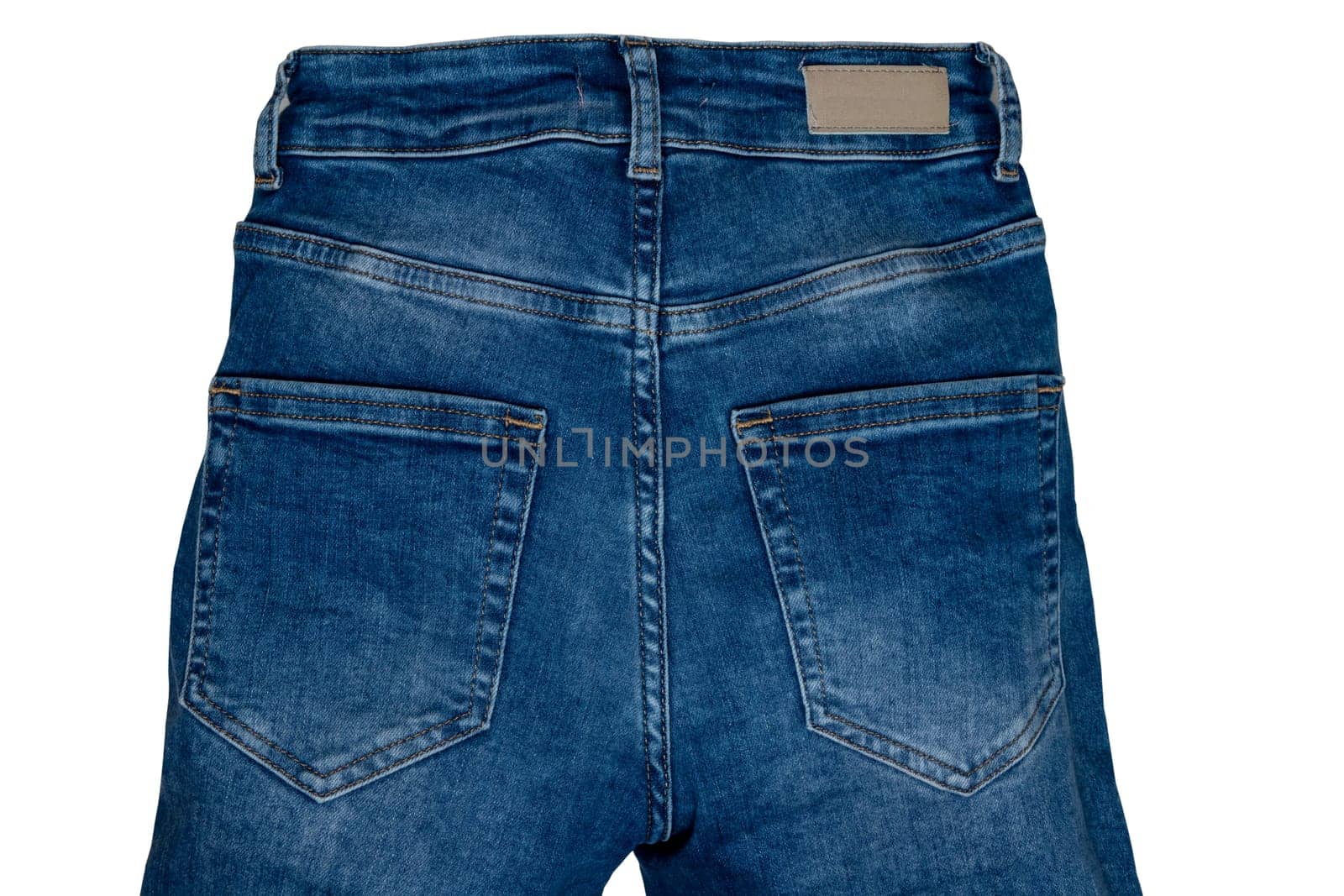 Jeans isolated. Trendy stylish blue denim pants or trousers isolated on a white background. Clipping path. summer and autumn fashion. Back view.