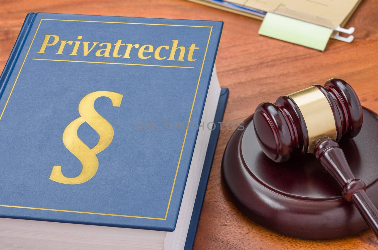 A law book with a gavel - German Translation of Private law - Privatrecht