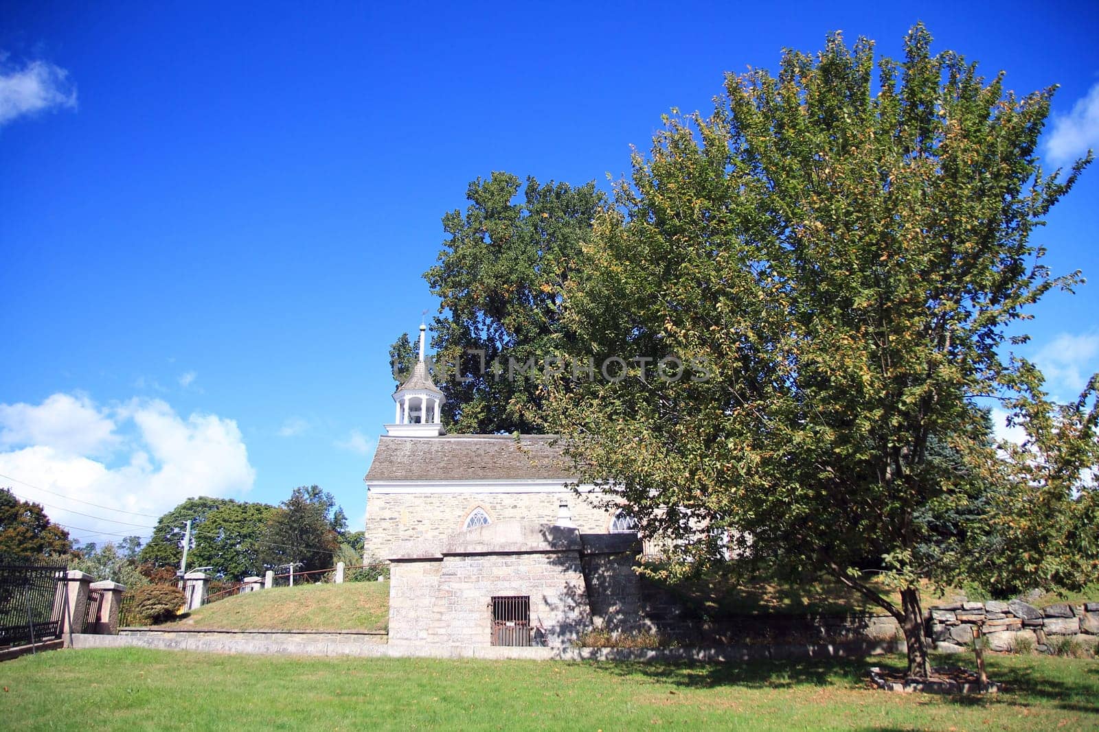 The big tree with the famous Sleepy Hollow Church on the back in the New York State