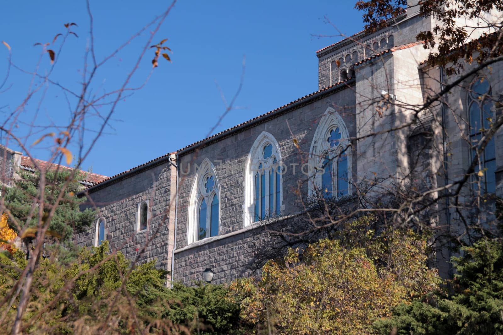 Close up of the white arch windows of the Cloisters in New York City