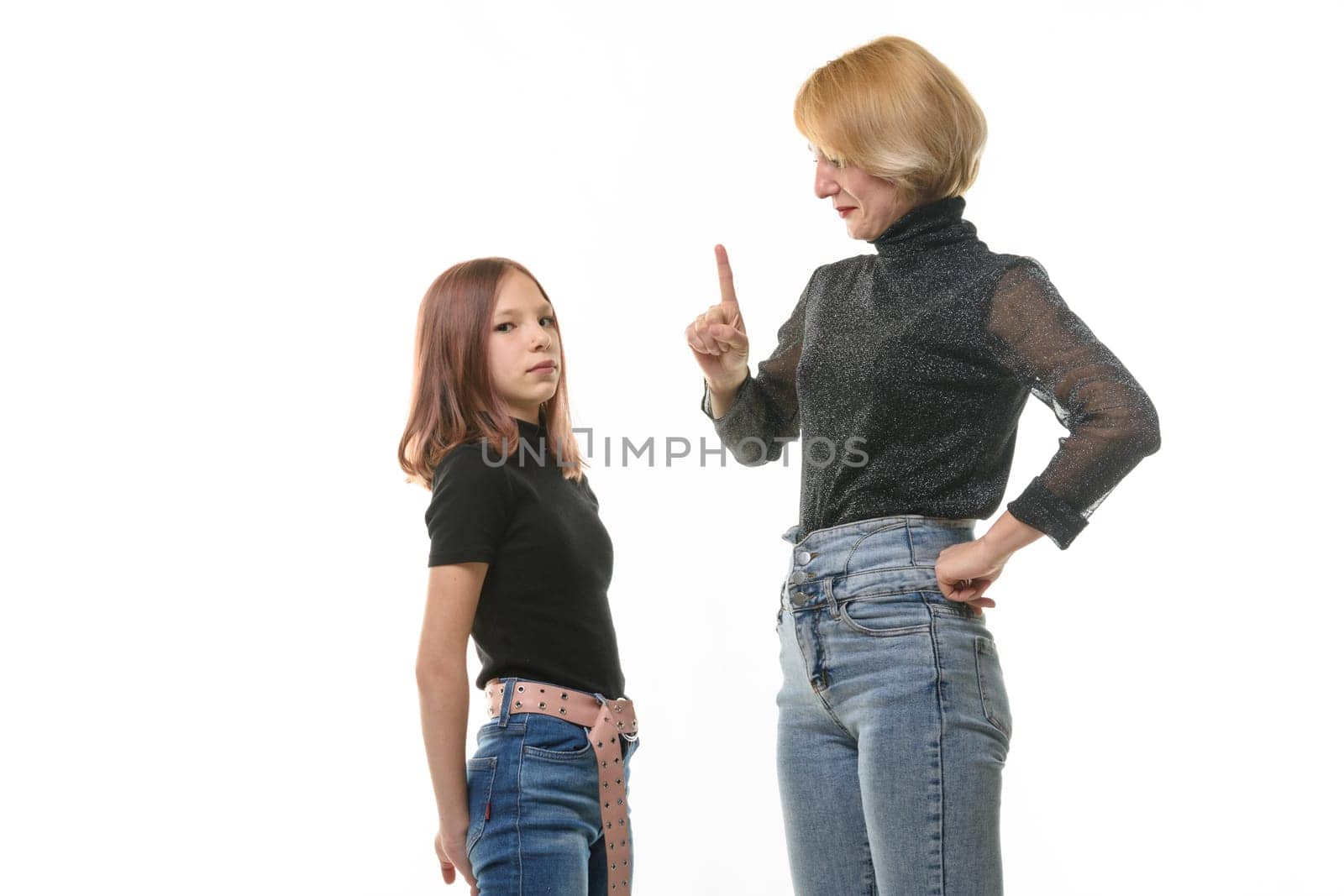 Woman punishing daughter for wrongdoing, isolated on white background