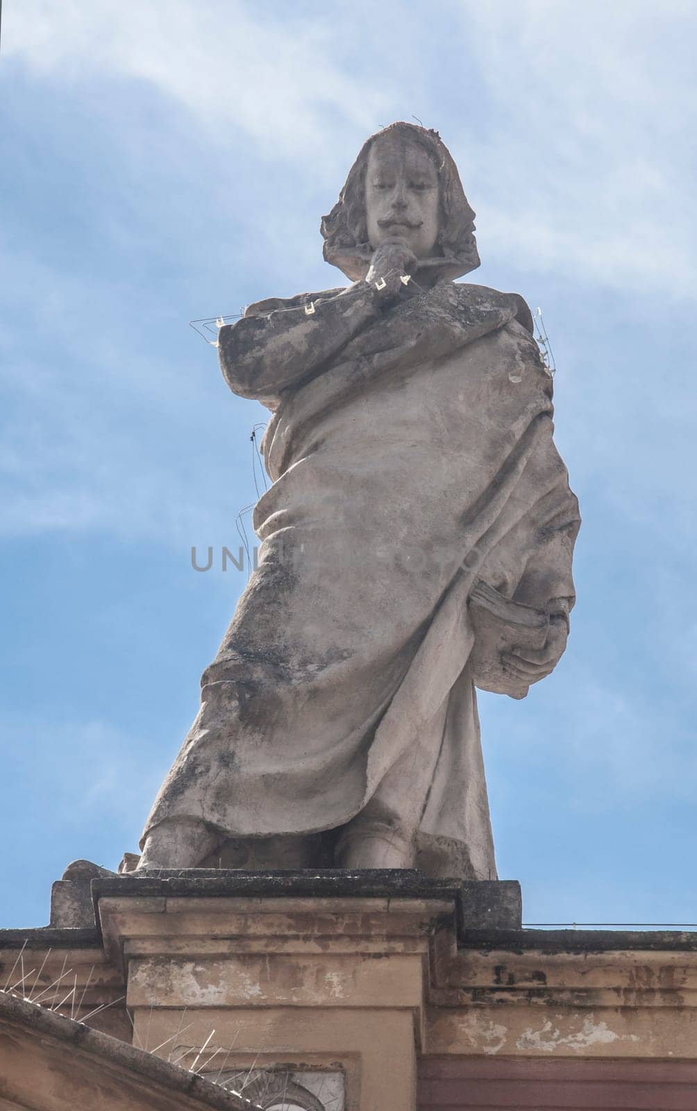 Seville, Spain: Sept, 27th, 2020: Diego Ortiz de Zuniga, 17th century Spanish historian. Palace of San Telmo, Seville, Spain. Sculpted by Antonio Susillo