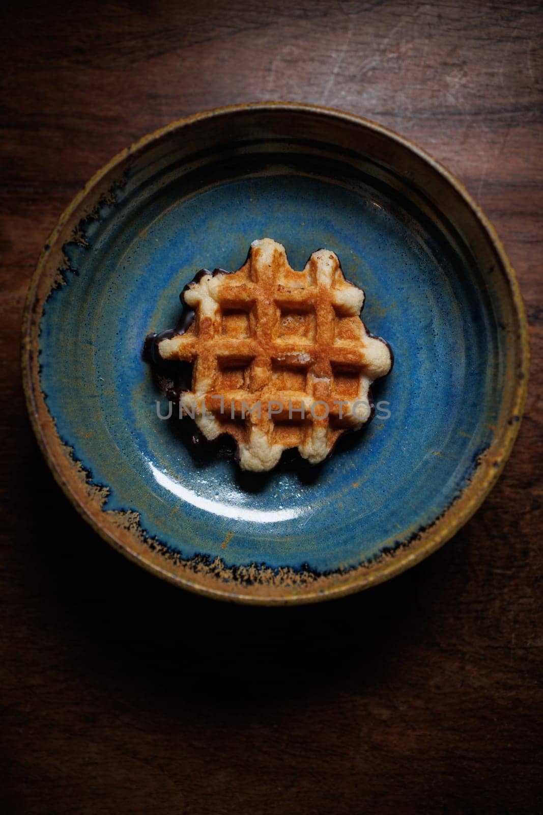 Waffle in handmade clay plate