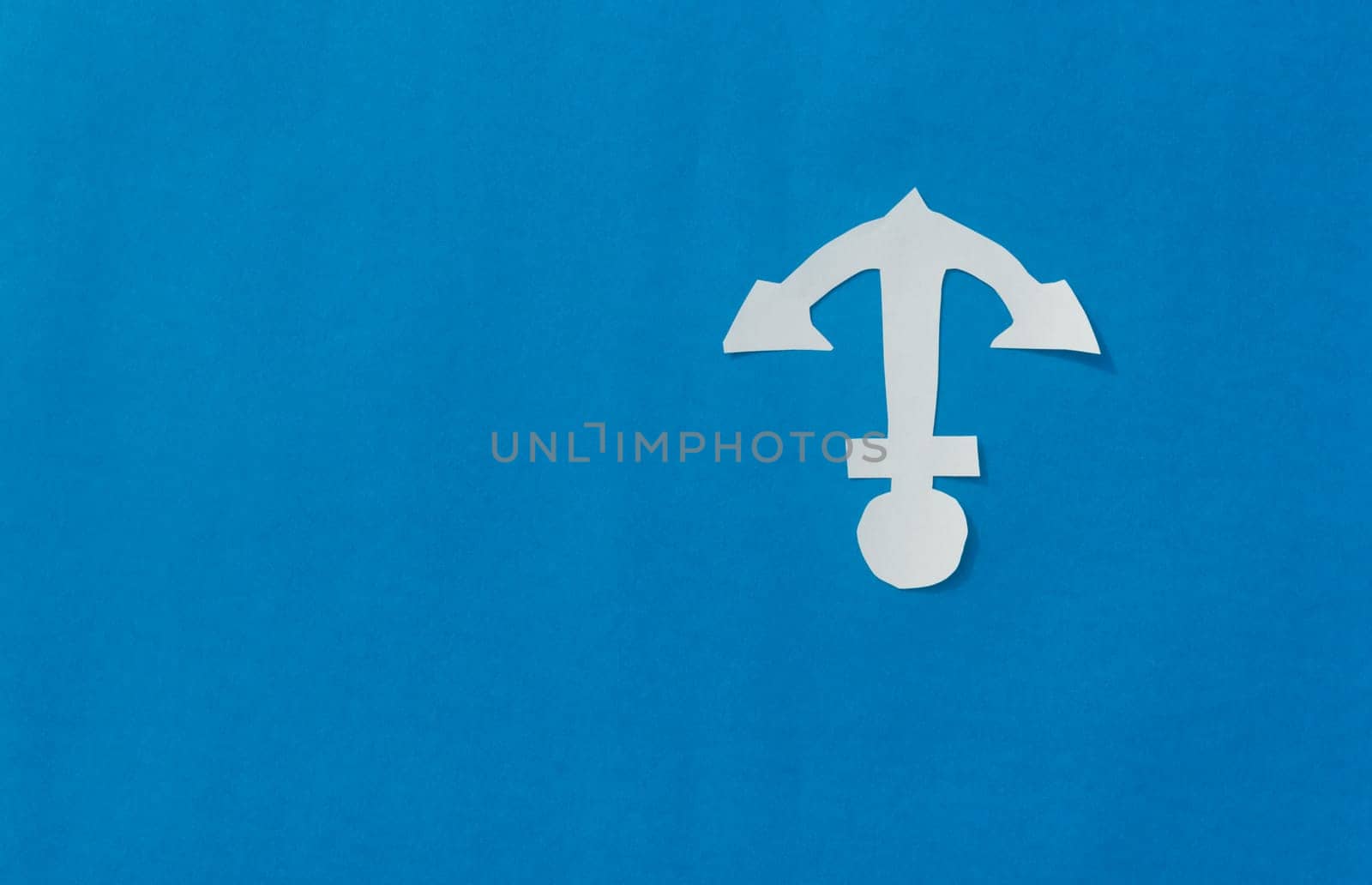 White Anchor on Isolated Blue background. Nautical theme. Copy Space.
