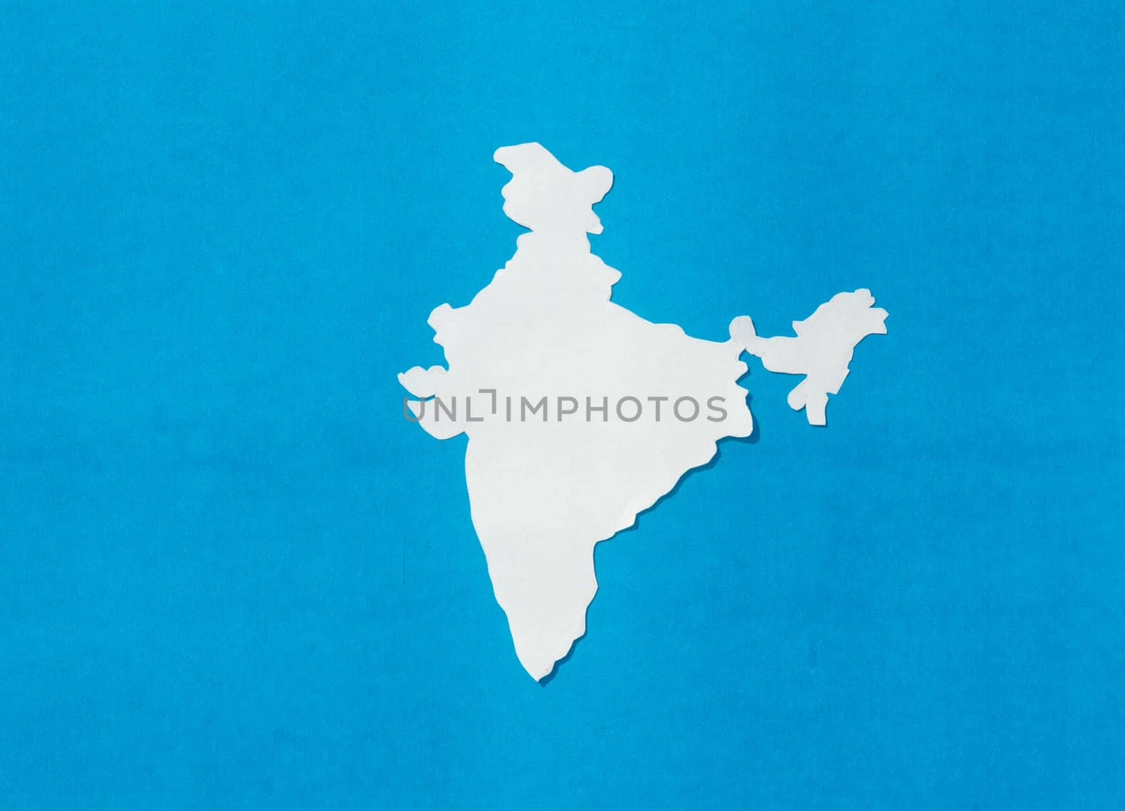 Paper cut India map isolated on Blue background.