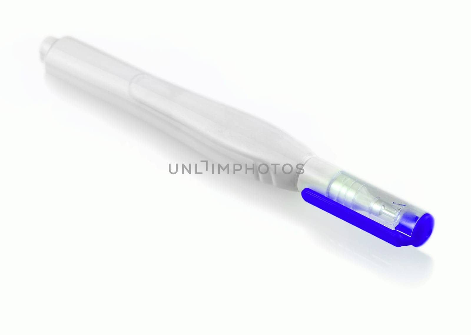 The blue pen corrector isolated on white background
