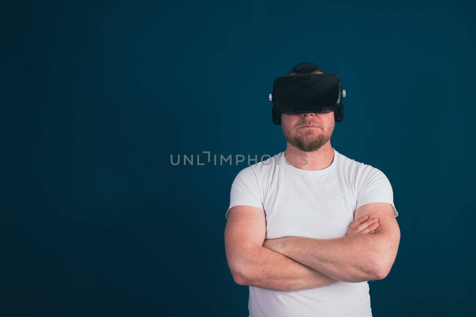 Metaverse digital cyber world technology. Man with VR glasses using AR augmented reality entertainment. NFT, game, futuristic lifestyle.