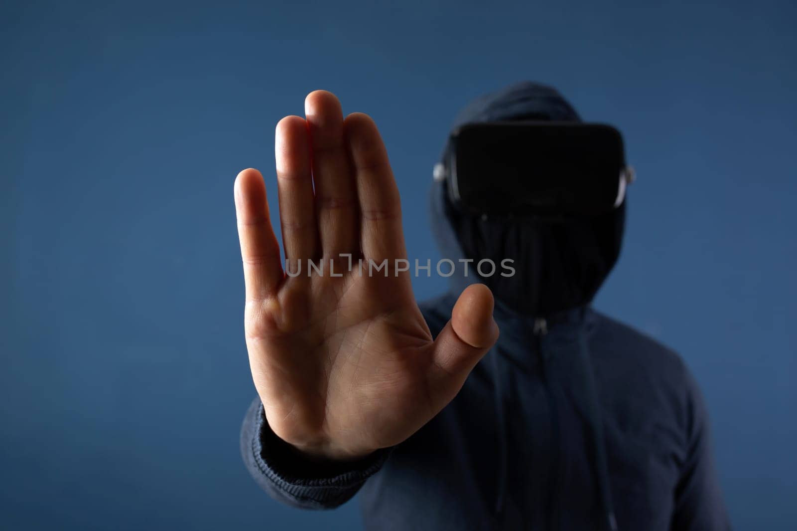 Metaverse digital cyber world technology. Man with VR glasses  playing AR augmented reality game and entertainment.NFT game futuristic lifestyle