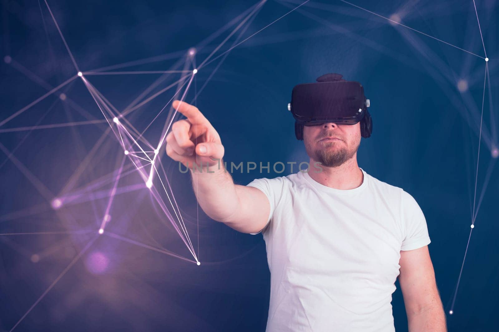 Metaverse digital cyber world technology. Man with VR glasses using AR augmented reality entertainment. NFT, game, futuristic lifestyle.