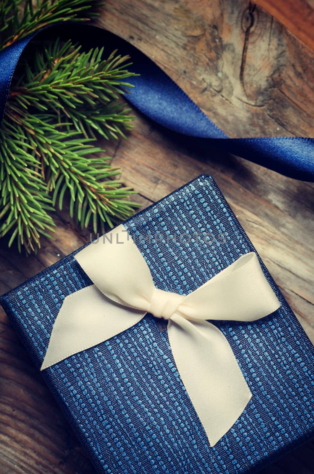 Christmas present on rustic wooden table