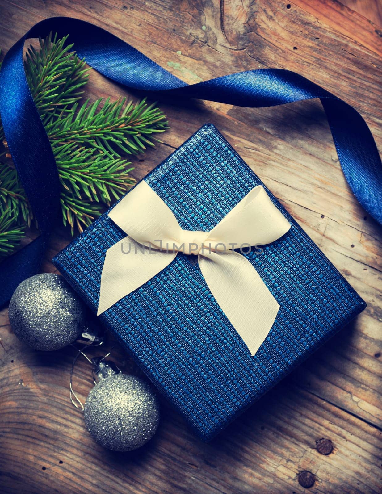 Christmas present on rustic wooden table