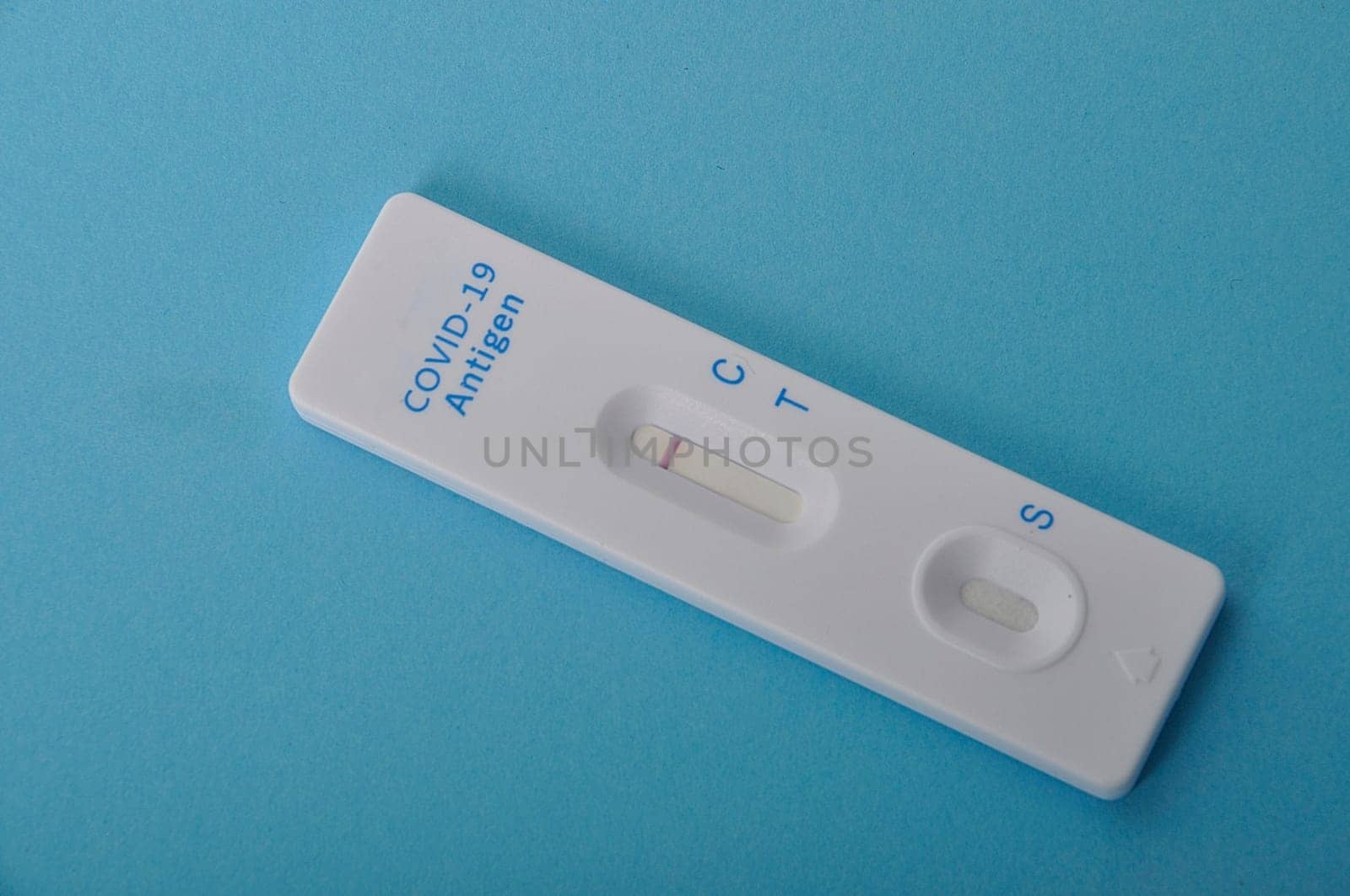 covid-19 self-test on a blue background