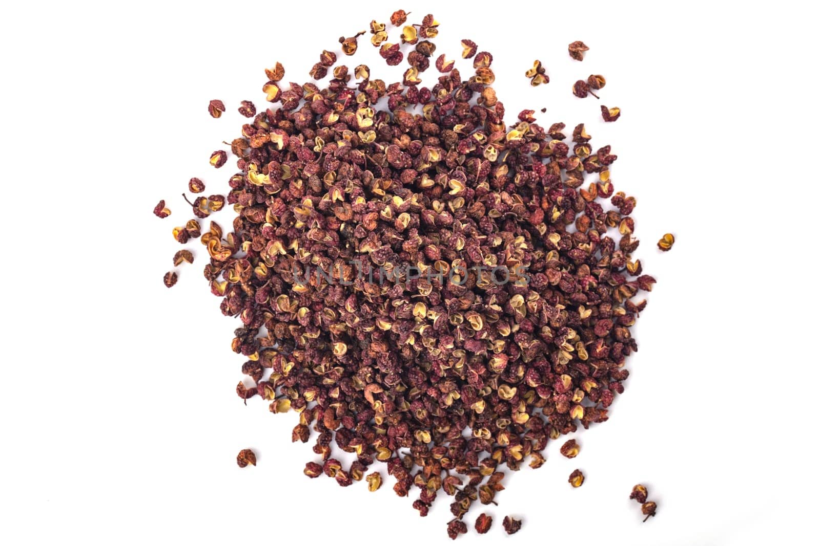 Heap of Szechuan pepper isolated over white background