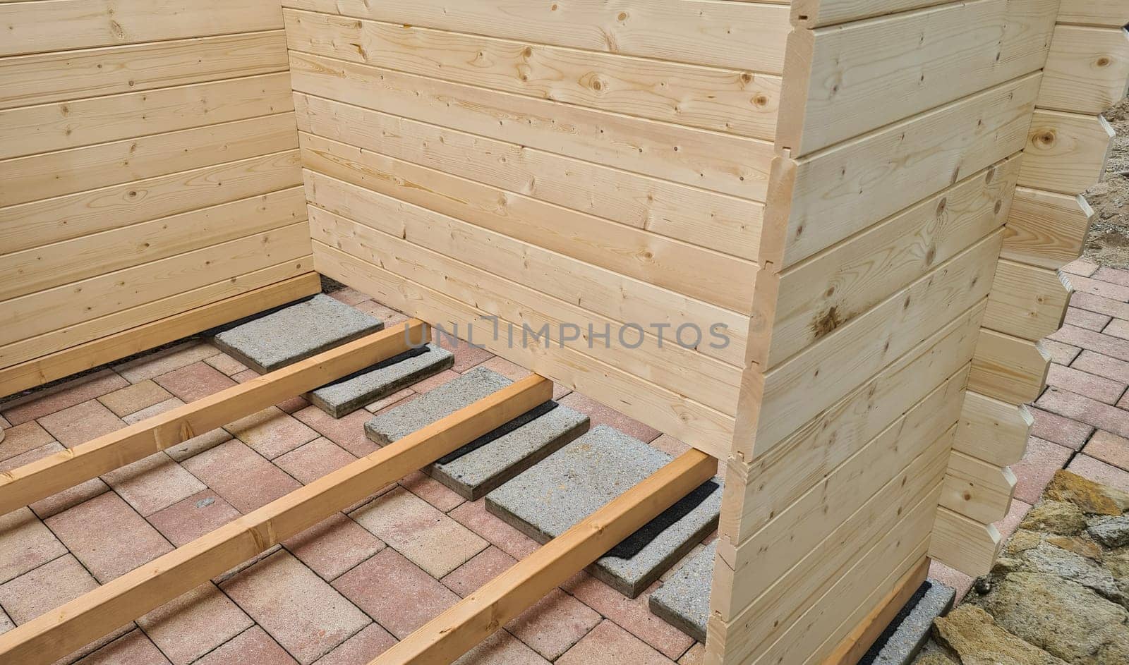 Garden shed built from tree trunks