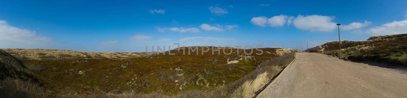 Dunes on Sylt island panorama. Sand dunes covered with moss