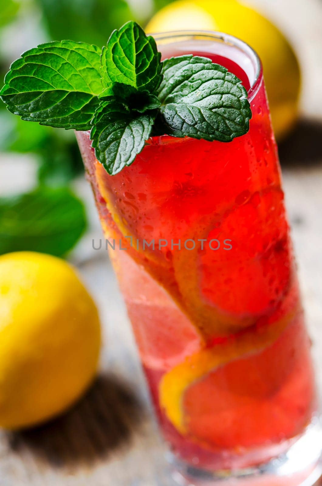Refreshing fruit cocktail with lemon and mint