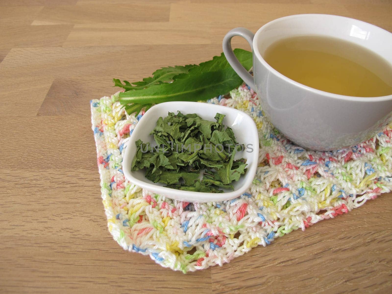 Homemade dandelion tea, tea with dried dandelion herb