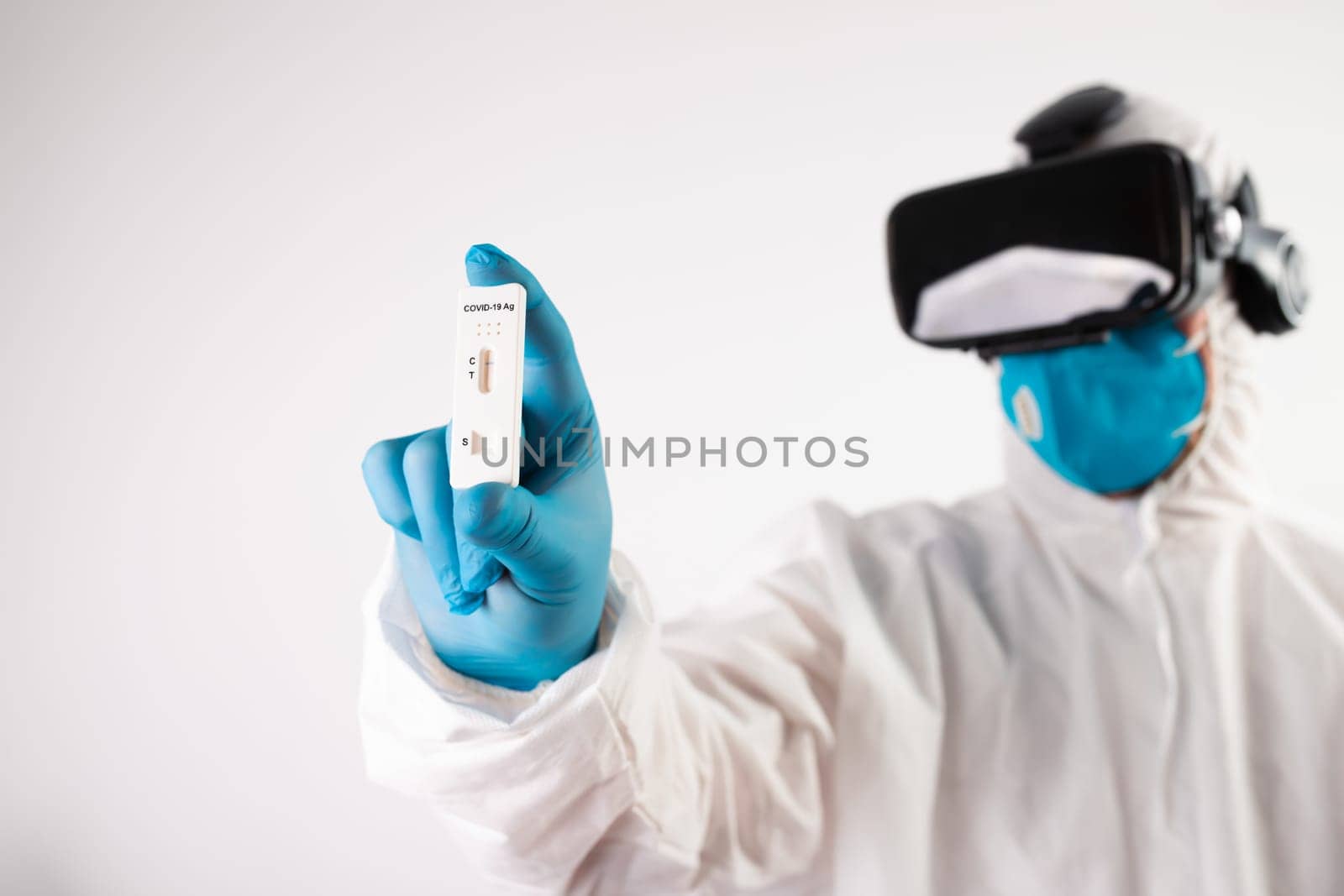 VR medicine. Doctor using virtual reality headset for medical purposes.
