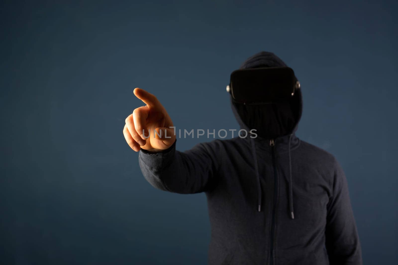 Metaverse digital cyber world technology. Man with VR glasses  playing AR augmented reality game and entertainment.NFT game futuristic lifestyle