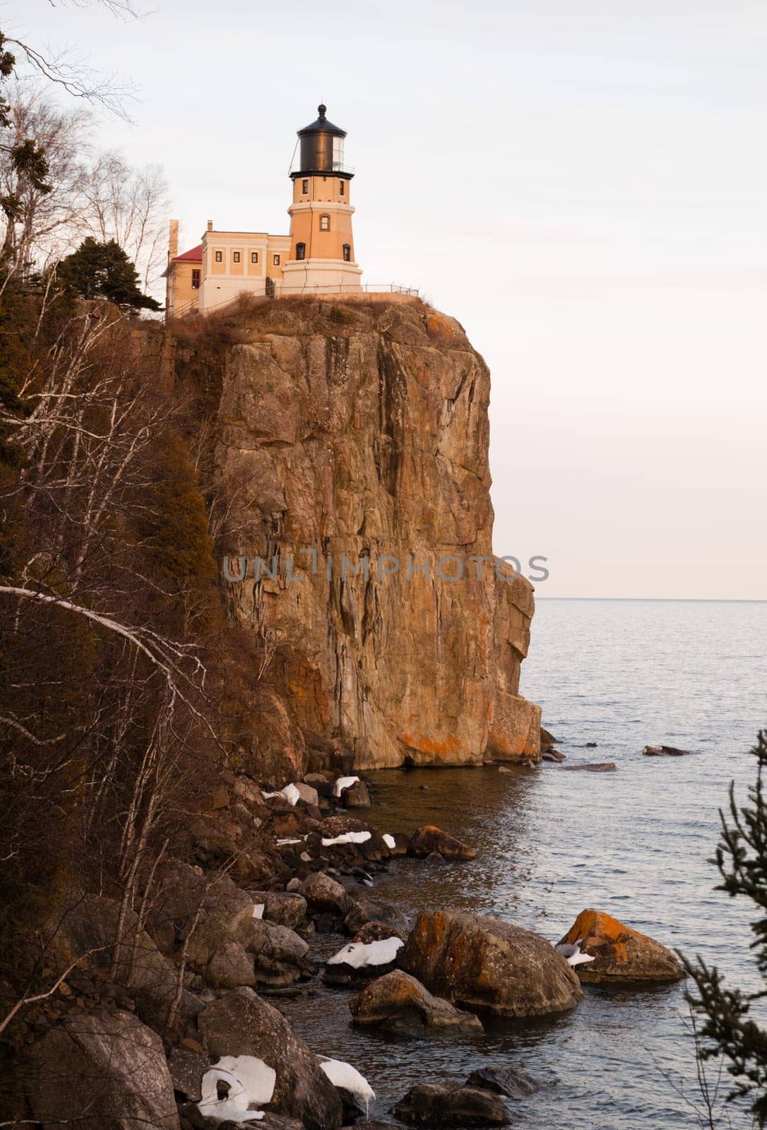 The last little bit of sun fades as Split Rock Light prepares to show the way