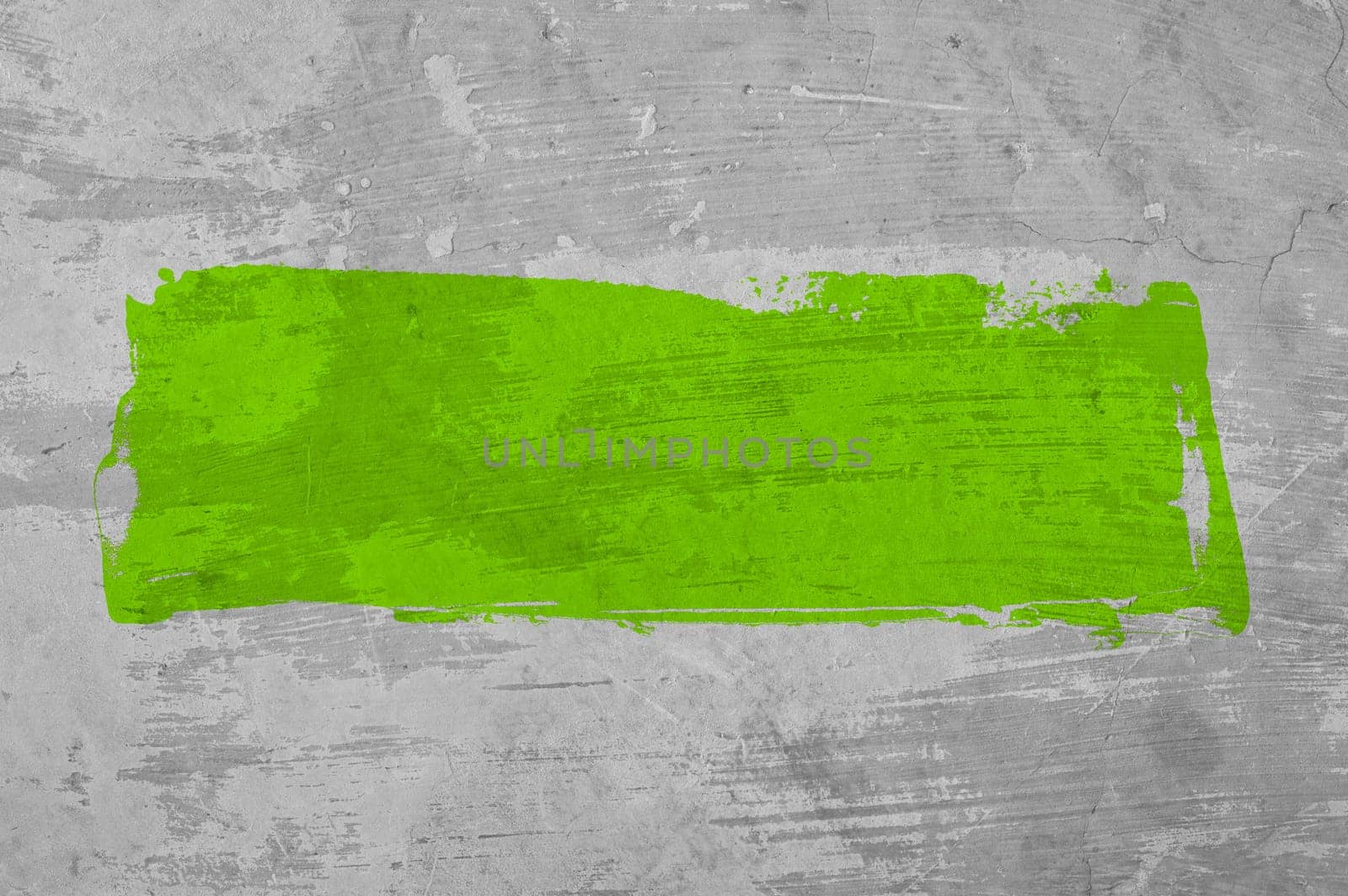 Grey concrete wall with green stripe