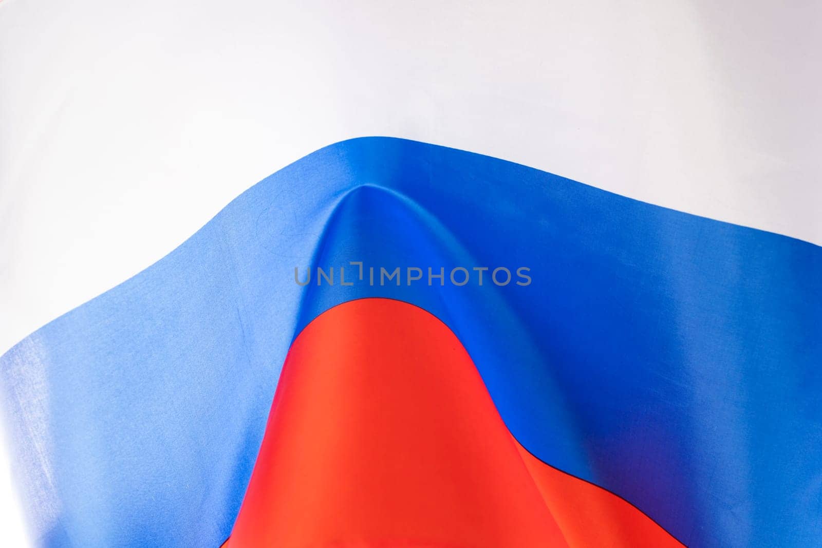 Waving colorful national flag of russia. Russian-Ukrainian conflict concept