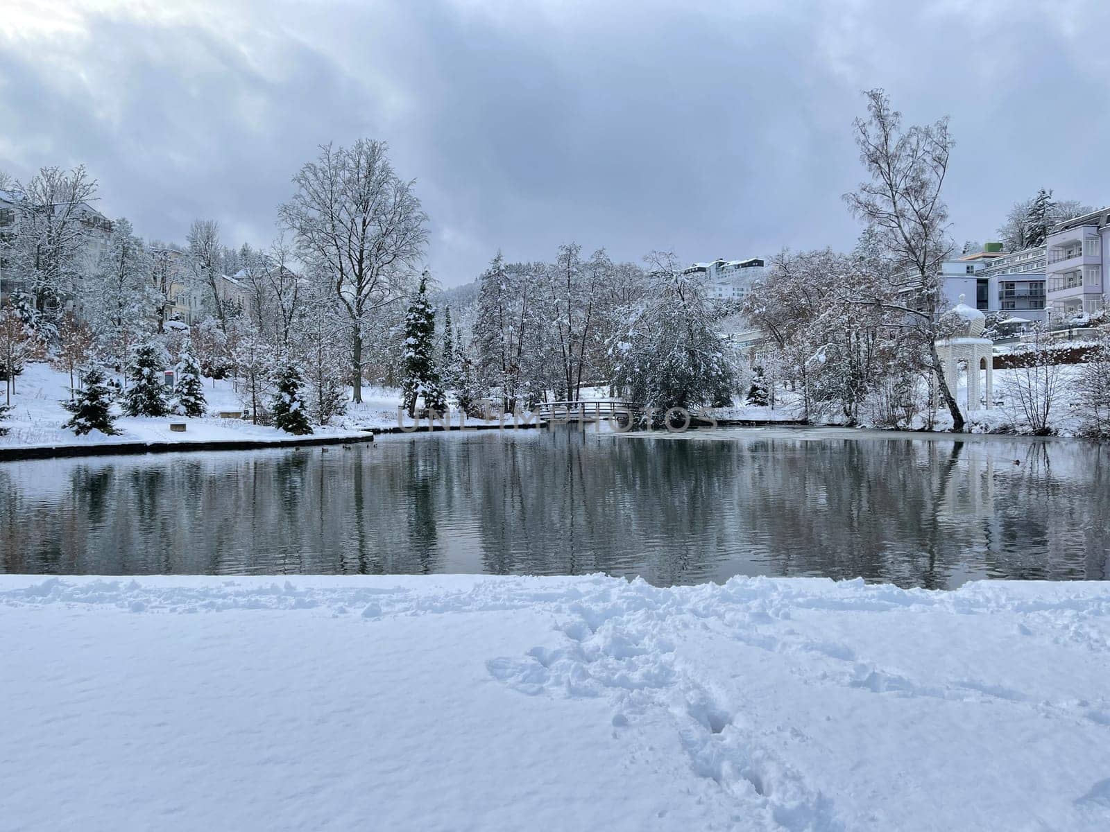 Spa park with fountain in winter,in the spa town of Bad Schwalbach in Hesse. Spa park with fountain in winter,in the spa town of Bad Schwalbach in Hesse.