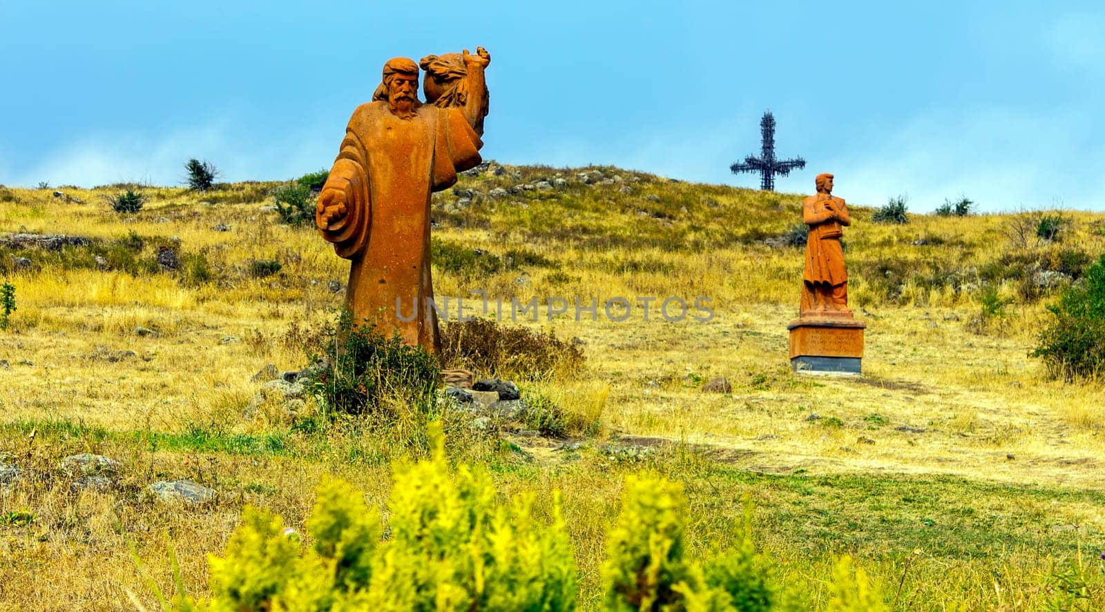 MOUNT ARAGATS,ARMENIA - SEPTEMBER 25,2017:Statues creator Armenian Alphabet - Mesrop Mashtots and his disciple on Mount Aragats, park of letters ( Armenian Alphabet),Armenia.