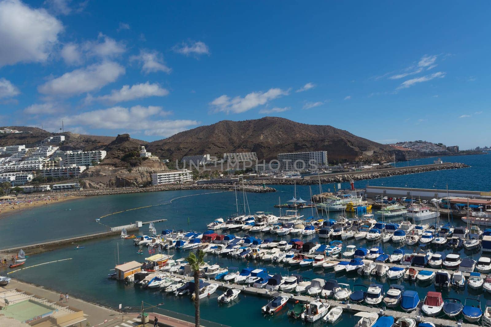 CRAN CANARIA, PUERTO RICO - NOVEMBER 16, 2019:.Marina in Puerto Rico de Gran Canaria. Postcard, spain.