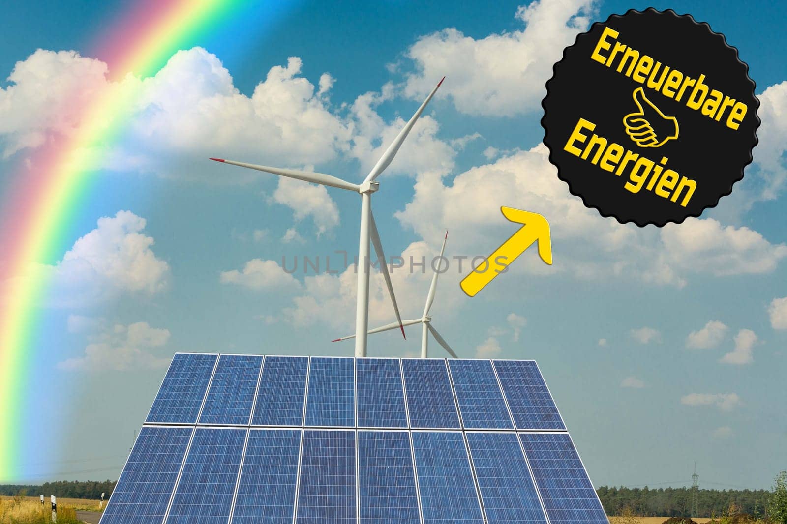 Sustainable green energy. Electric windmill generators in the sunrise..Sign with  Caption Renewable energy