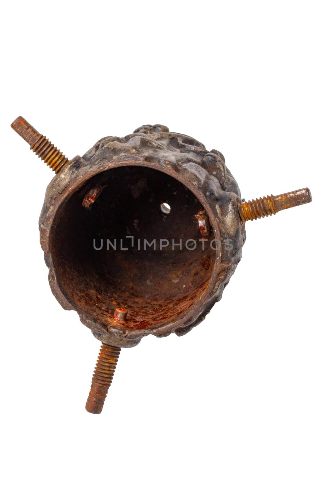 Closeup of an antique cast-iron Christmas tree holder in the shape of a pine cone for attaching the Christmas tree to the rotating Christmas tree stand. Clipping path. Macro.