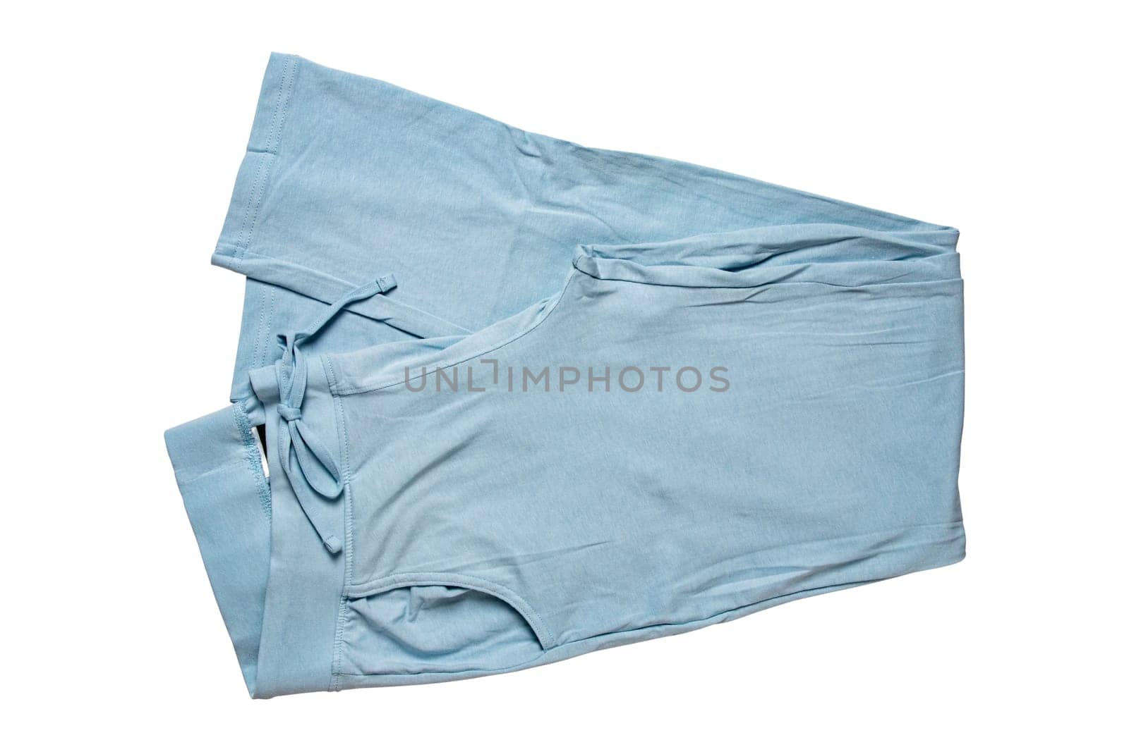 Sweat pants isolated. Close-up of womans fashionable blue casual trousers or jersey trousers isolated on a white background. Jogging outfit for workout. Clipping path.