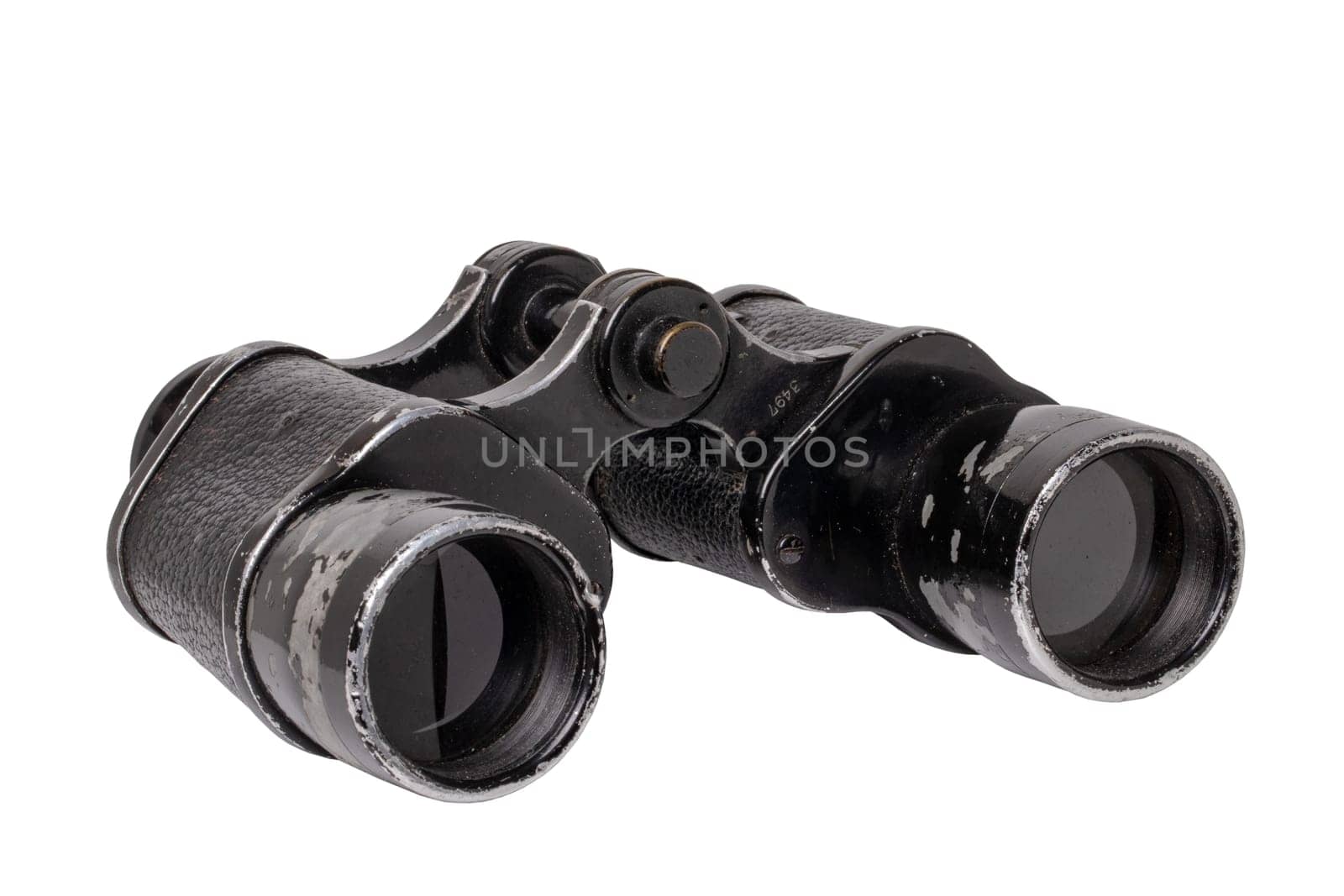Vintage binoculars isolated. Close-up of an old german Binoculars with leather straps used from military during the second world war isolated on white. Macro. Clipping path.
