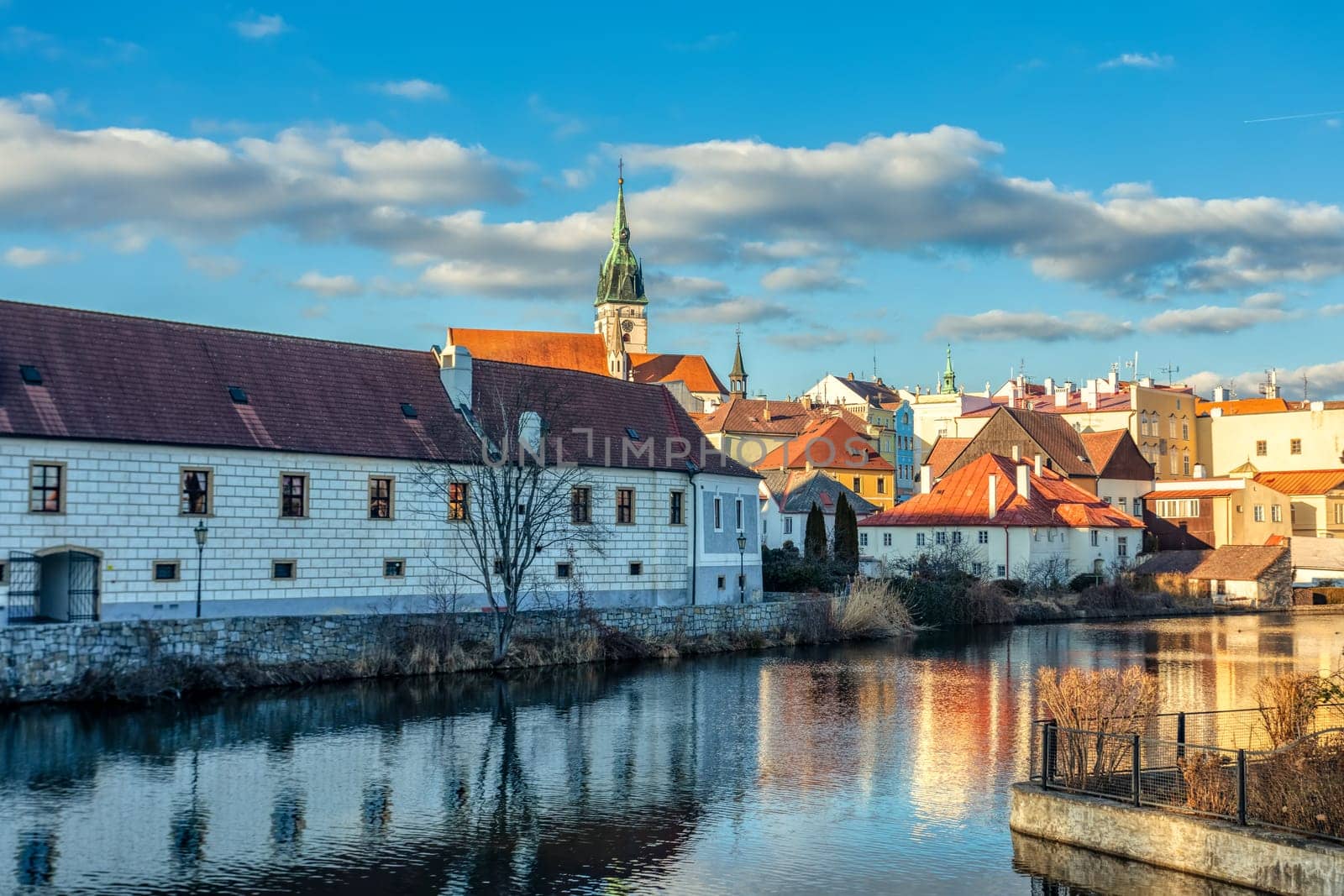 Old town in city Jindrichuv Hradec reflecting in water, Czech Republic in the region South Bohemia.