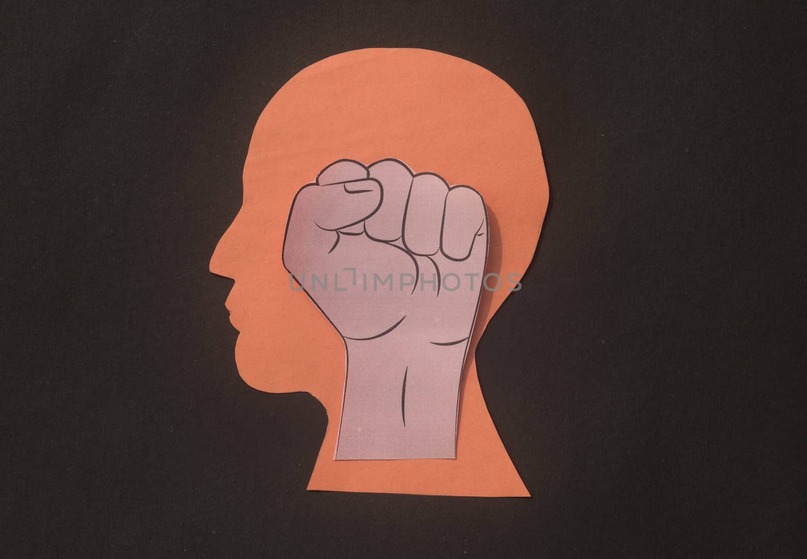 Illustration of firm human hand placed on a silhouette head.