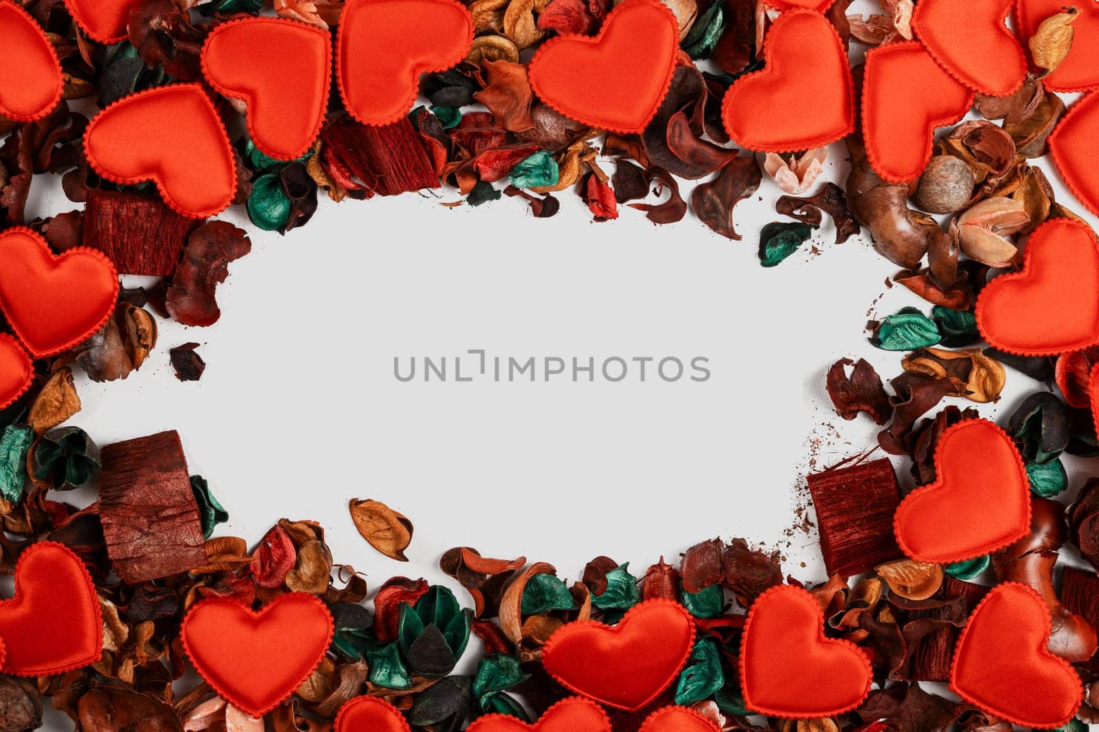 Different dry flowers with red hearts background. with copy space. Valentines day or love concept