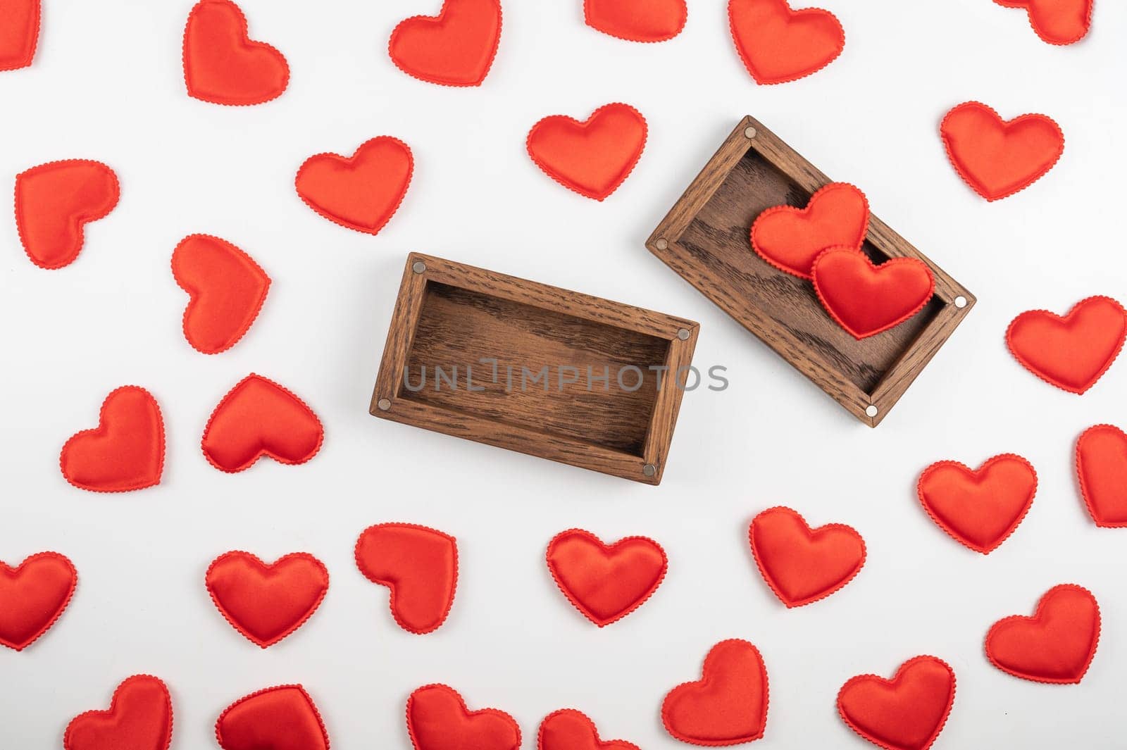 Valentine day white wood background with gift box with red hearts. Valentines day or love concept, copy space