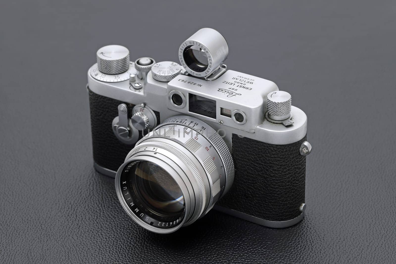 Kagawa, Japan - February 27, 2022: Leica ⅢG rangefinder camera with Leitz 50mm f1.4 Summilux L-mount lens. Vintage collectible classic lens concept.
