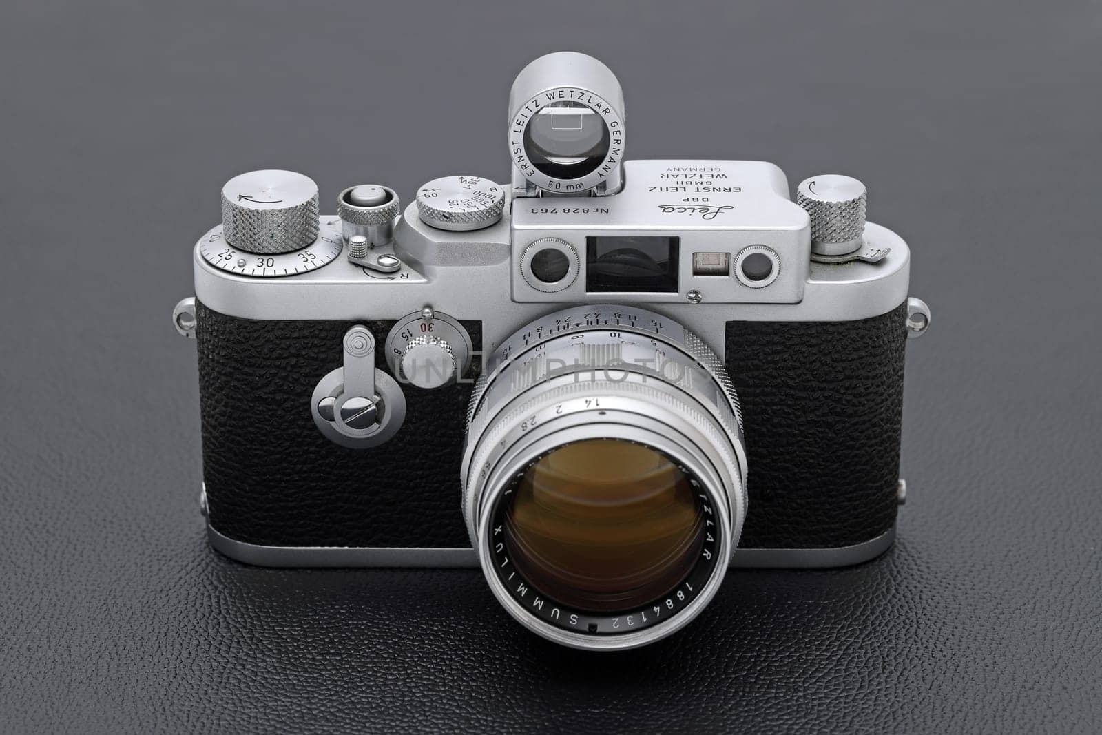 Kagawa, Japan - February 27, 2022: Leica ⅢG rangefinder camera with Leitz 50mm f1.4 Summilux L-mount lens. Vintage collectible classic lens concept.