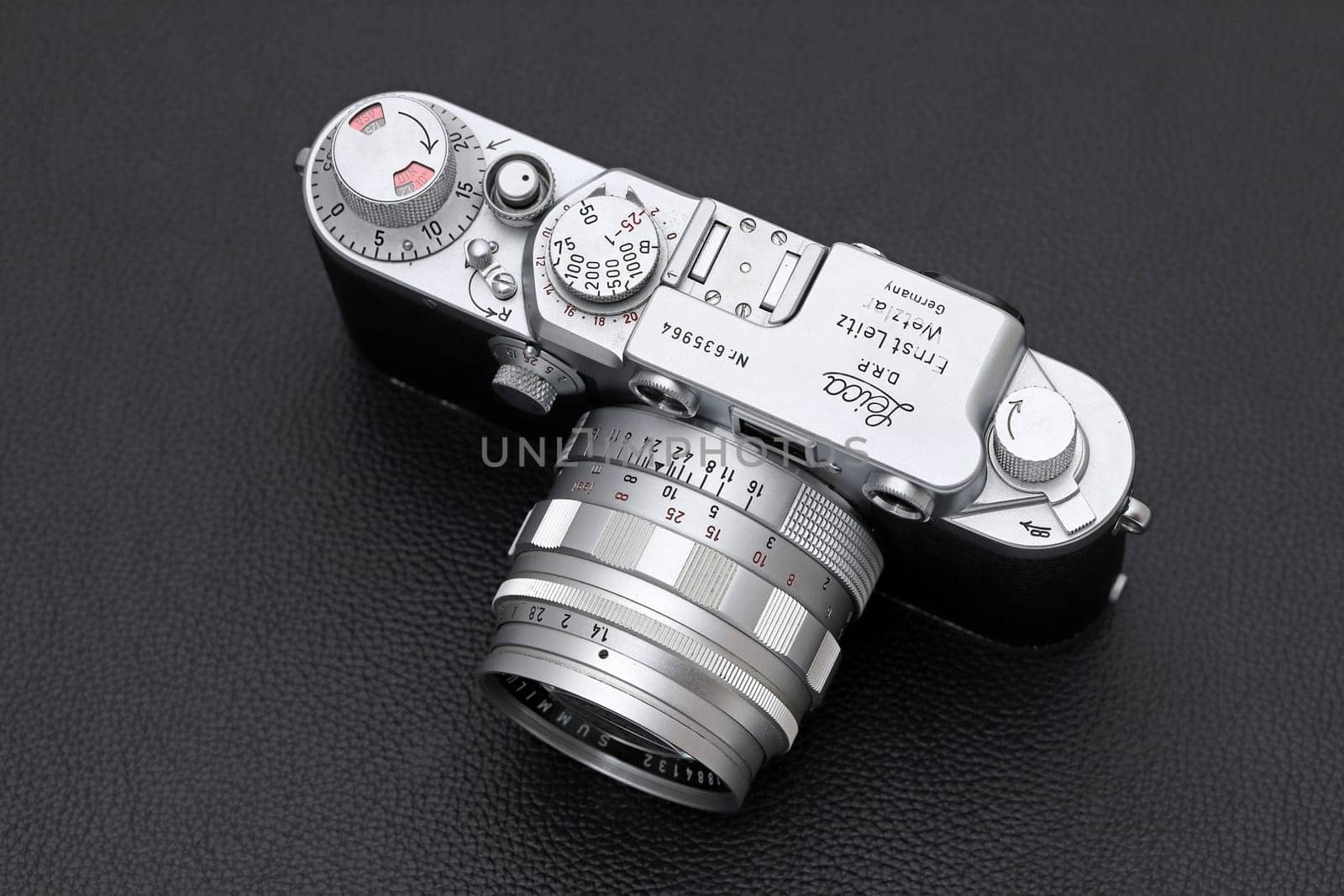 Kagawa, Japan - February 27, 2022: Leica ⅢF rangefinder camera with Leitz 50mm f1.4 Summilux L-mount lens. Vintage collectible classic lens concept.