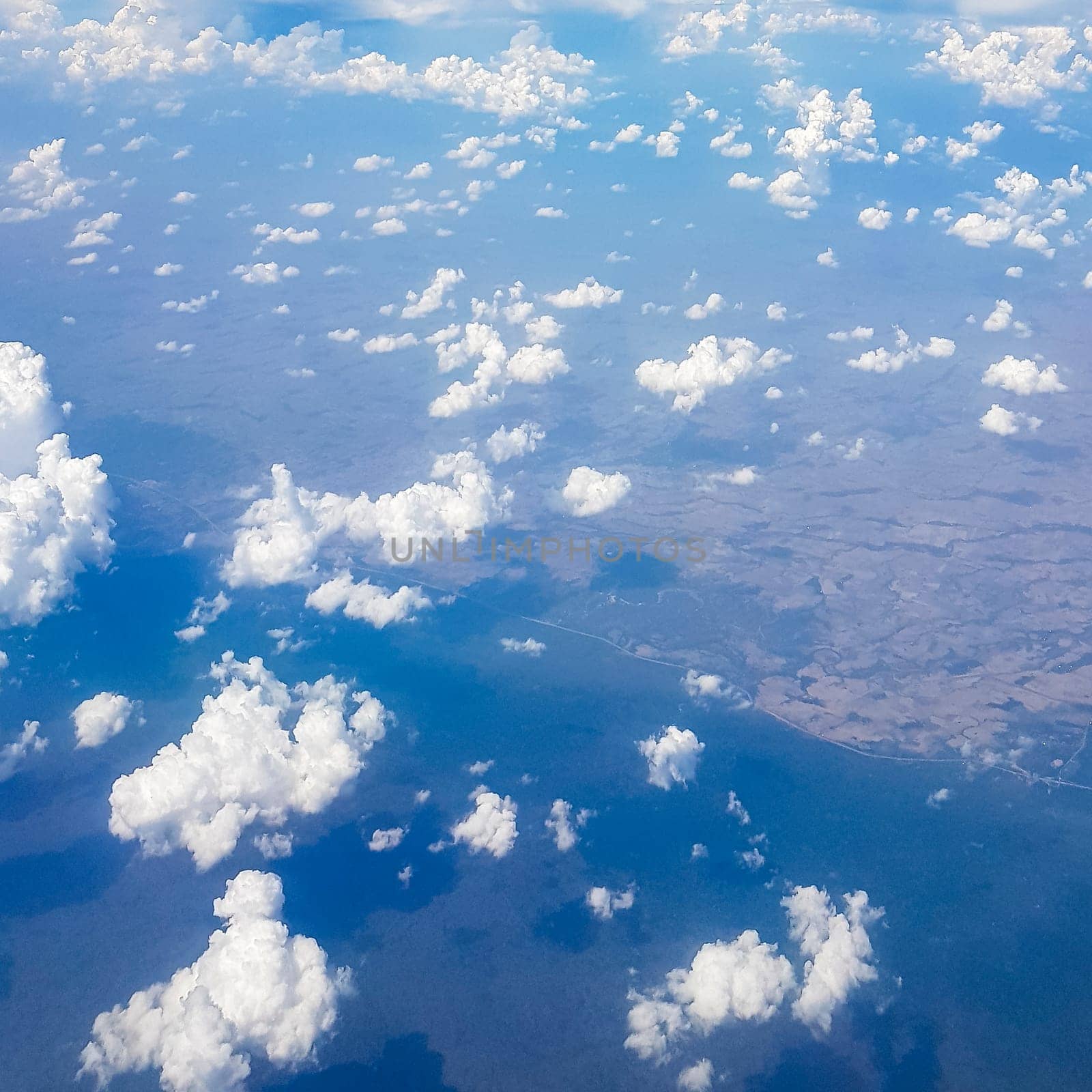 Flying above the beautiful clouds over the countryside of Thailand.