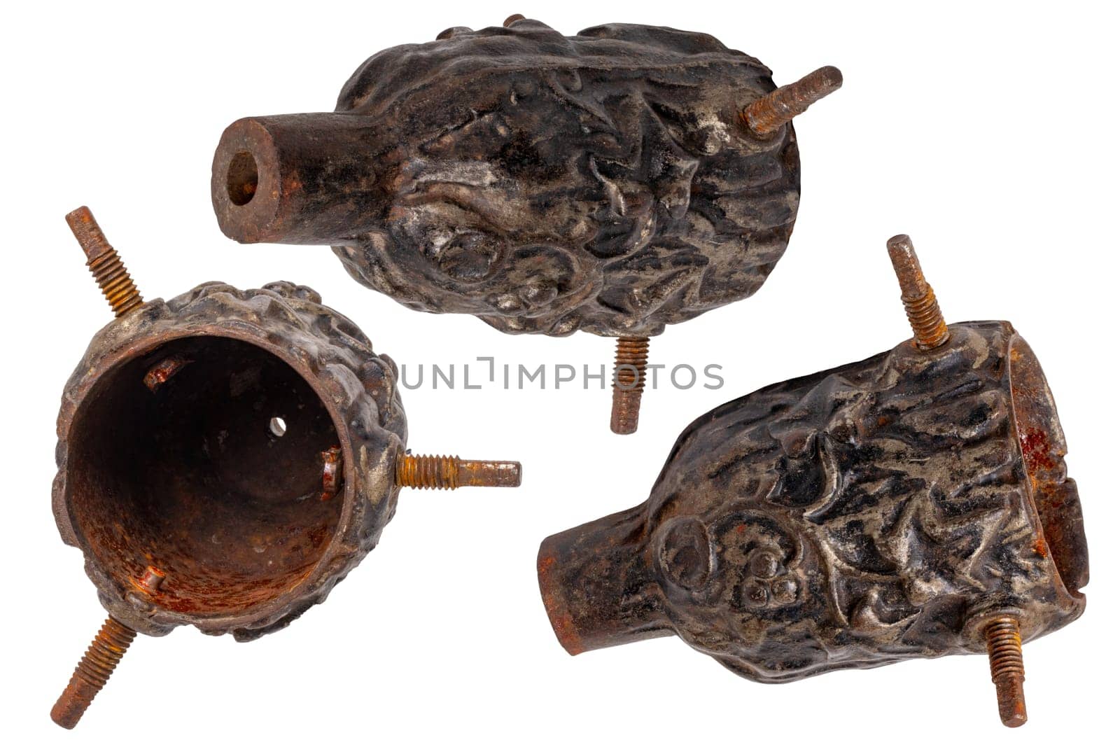 Closeup of an antique cast-iron Christmas tree holder in the shape of a pine cone in three views for attaching the Christmas tree to the rotating Christmas tree stand. Macro.