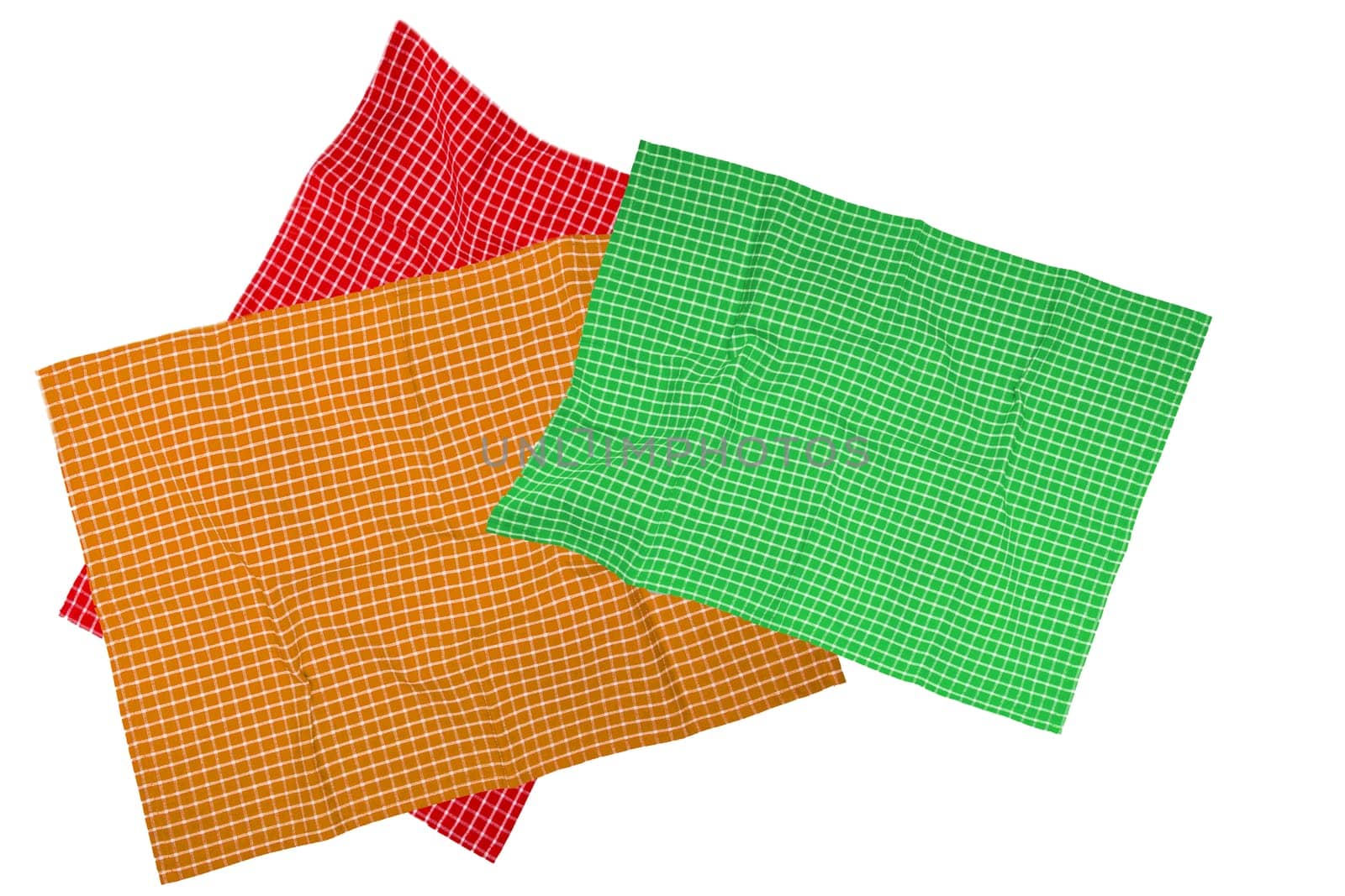 Closeup of a green, brown, red white checkered napkin or tablecloth texture isolated on a white background. Kitchen accessories. Top view.