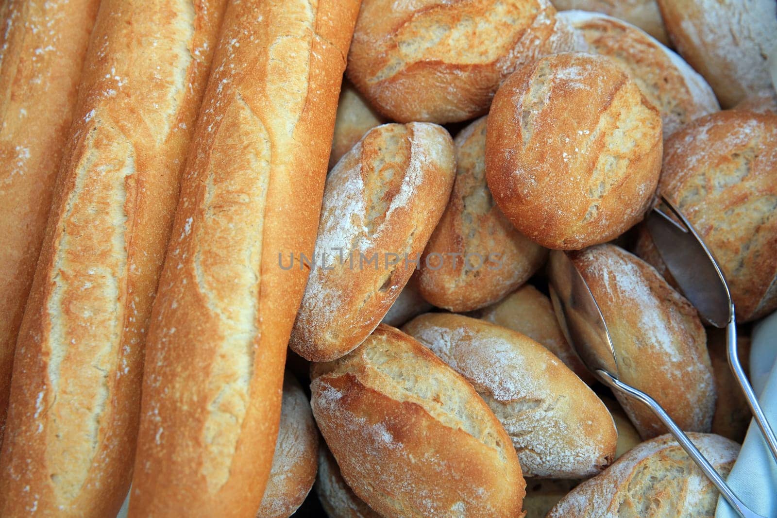 Bun Rolls and Baguette in a Basket