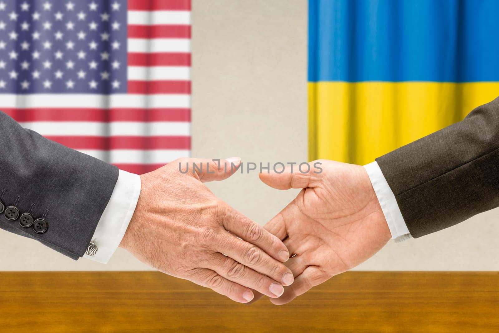 Representatives of the USA and Ukraine shake hands