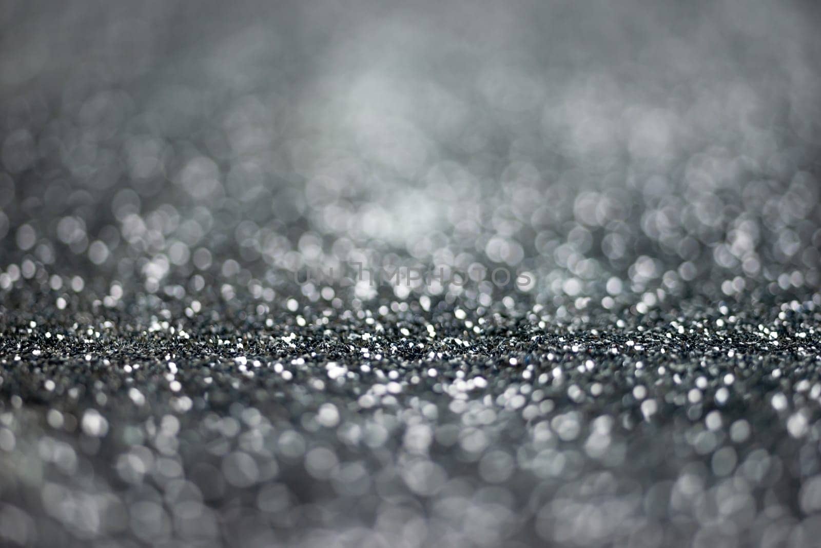 Glitter light abstract black bokeh light blurred background