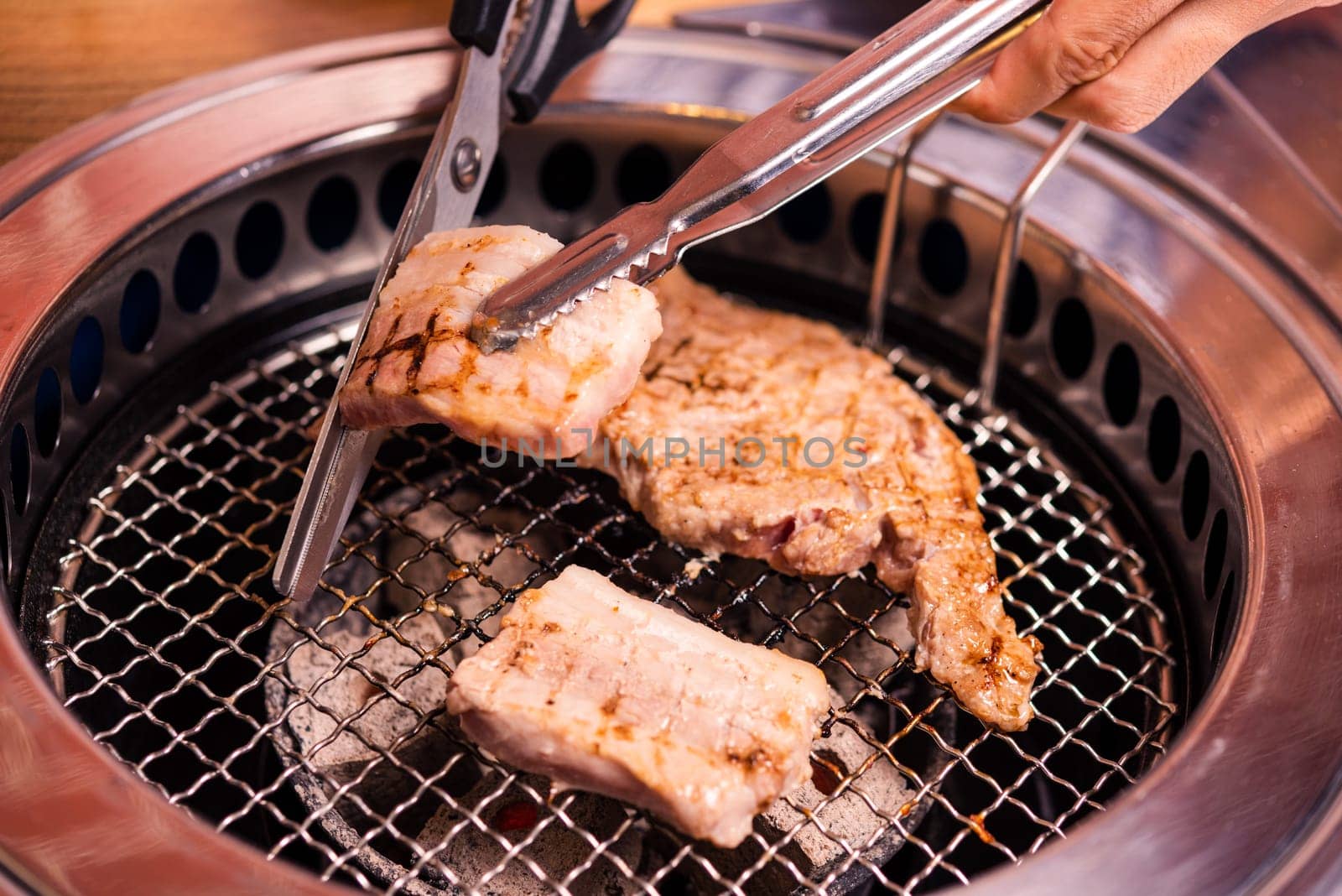 Korean beef barbecue on hot coals. Ready for grilling meat pork Korean BBQ traditional style on stove serve in restaurant, Japanese food